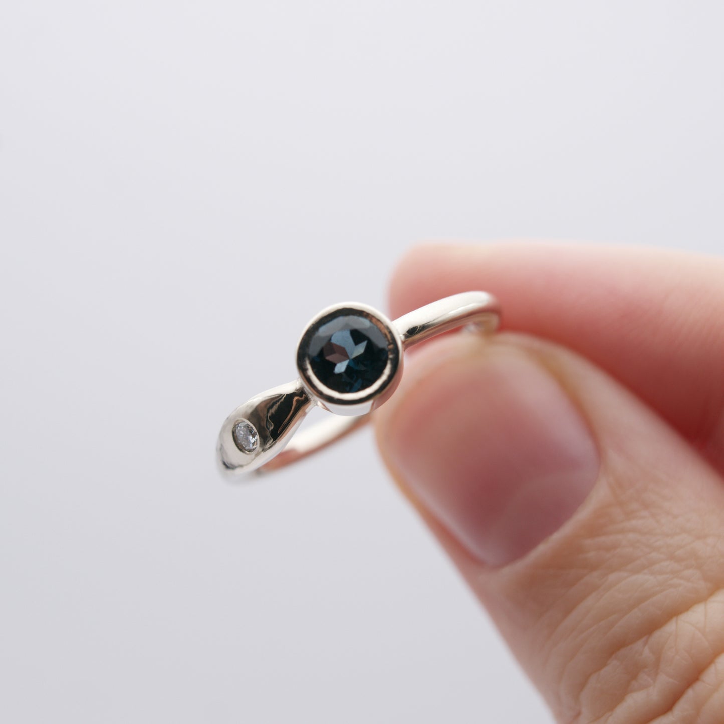 ENGAGEMENT RING WITH LONDON BLUE TOPAZ AND DIAMOND