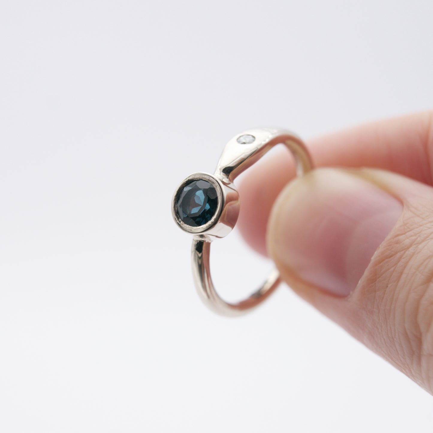 ENGAGEMENT RING WITH LONDON BLUE TOPAZ AND DIAMOND