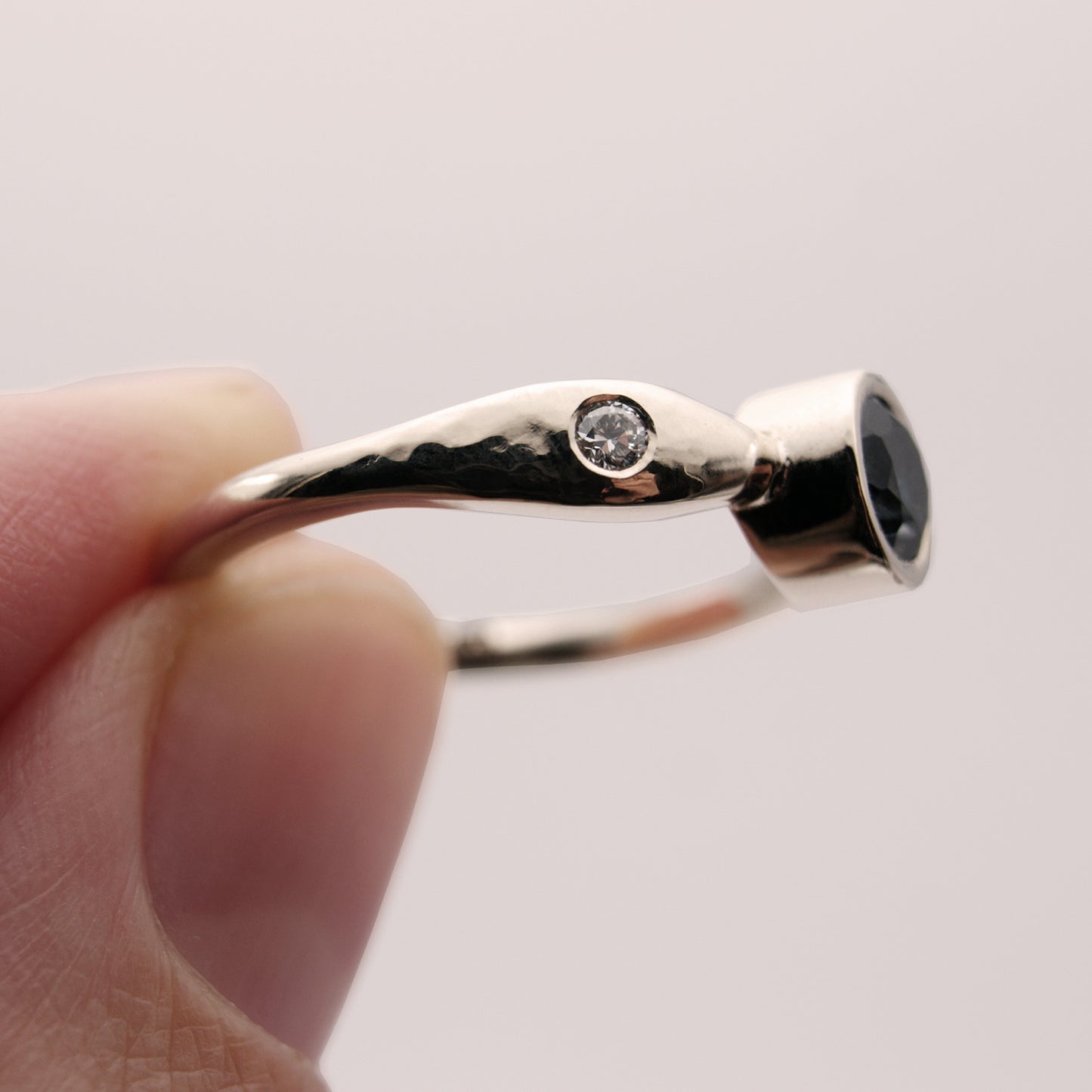 ENGAGEMENT RING WITH LONDON BLUE TOPAZ AND DIAMONDS