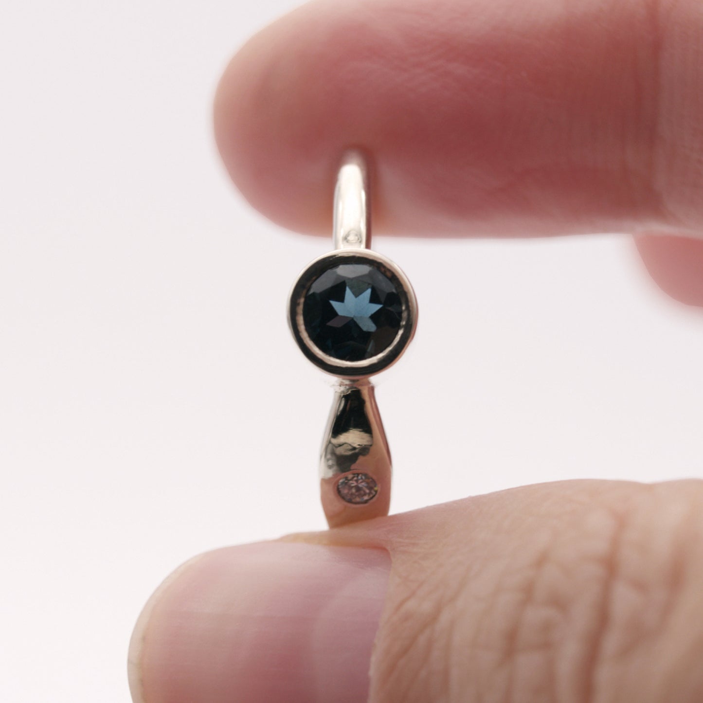 ENGAGEMENT RING WITH LONDON BLUE TOPAZ AND DIAMONDS