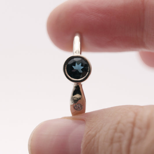ENGAGEMENT RING WITH LONDON BLUE TOPAZ AND DIAMONDS
