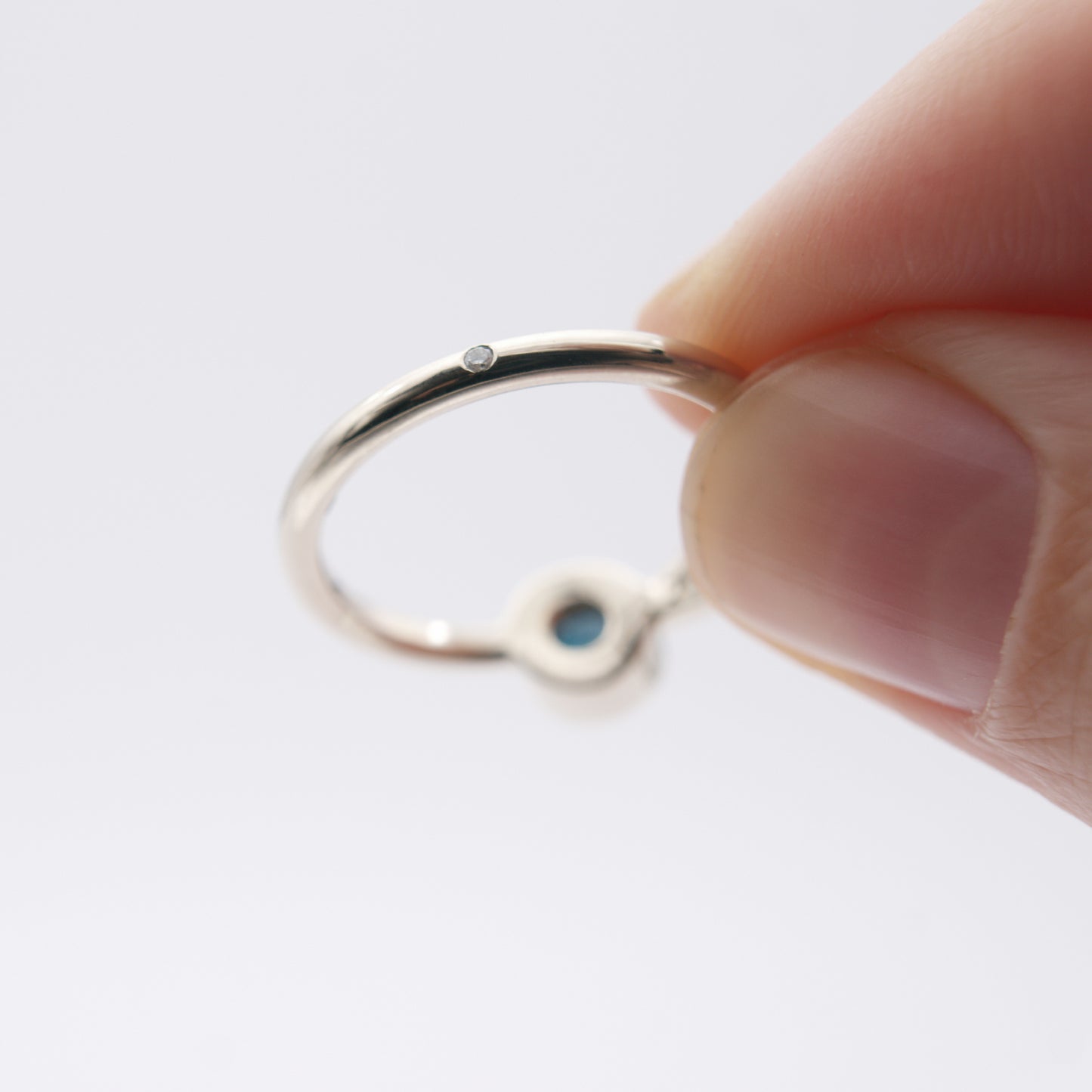 ENGAGEMENT RING WITH LONDON BLUE TOPAZ AND DIAMOND