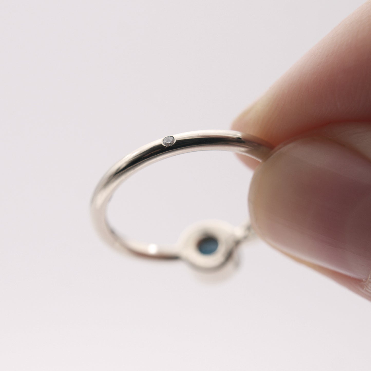 ENGAGEMENT RING WITH LONDON BLUE TOPAZ AND DIAMONDS