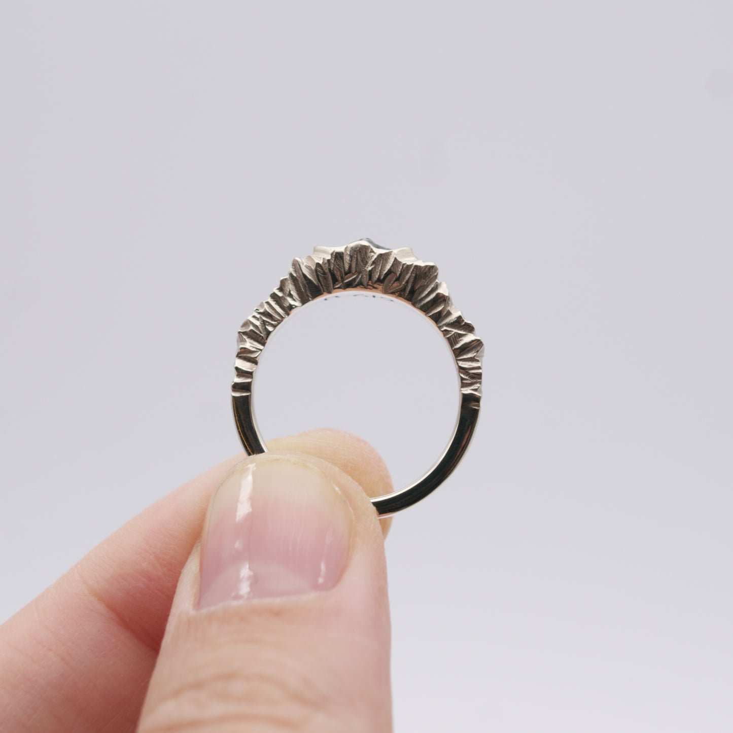 ENGAGEMENT RING WITH METEORITE AND BLACK SAPPHIRE