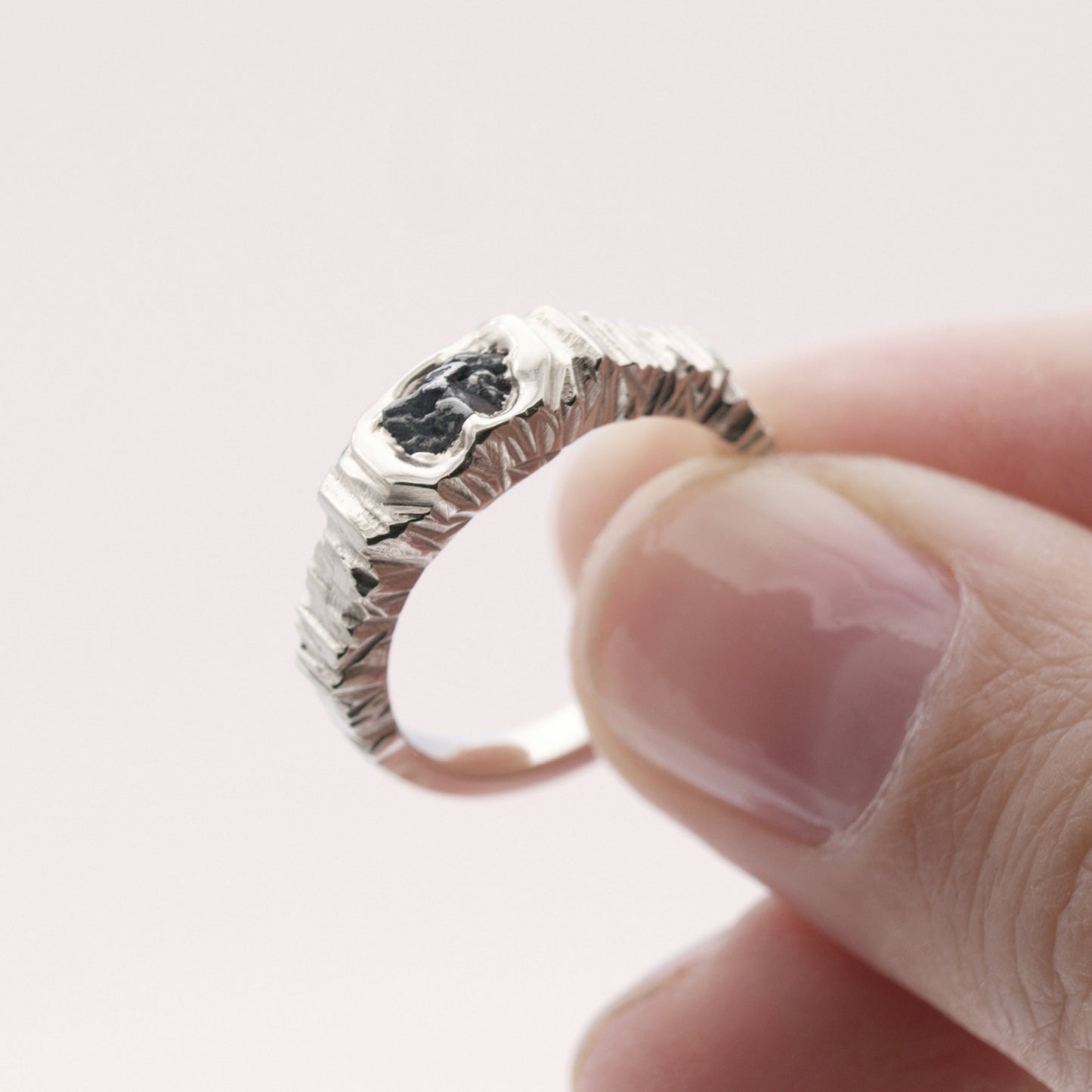 ENGAGEMENT RING WITH METEORITE AND BLACK SAPPHIRE