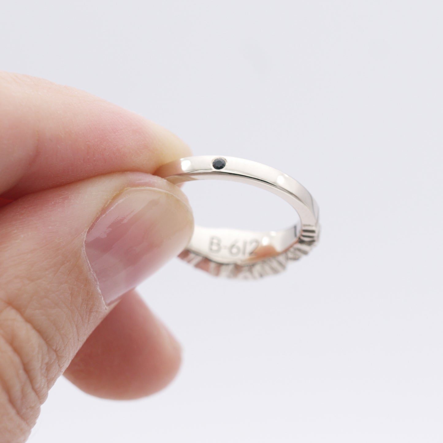 ENGAGEMENT RING WITH METEORITE AND BLACK SAPPHIRE